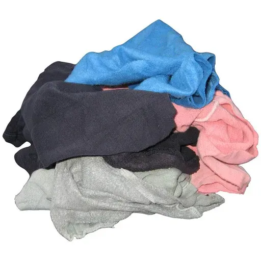 A close up of a bunch of different colored fabrics stacked on top of each other.