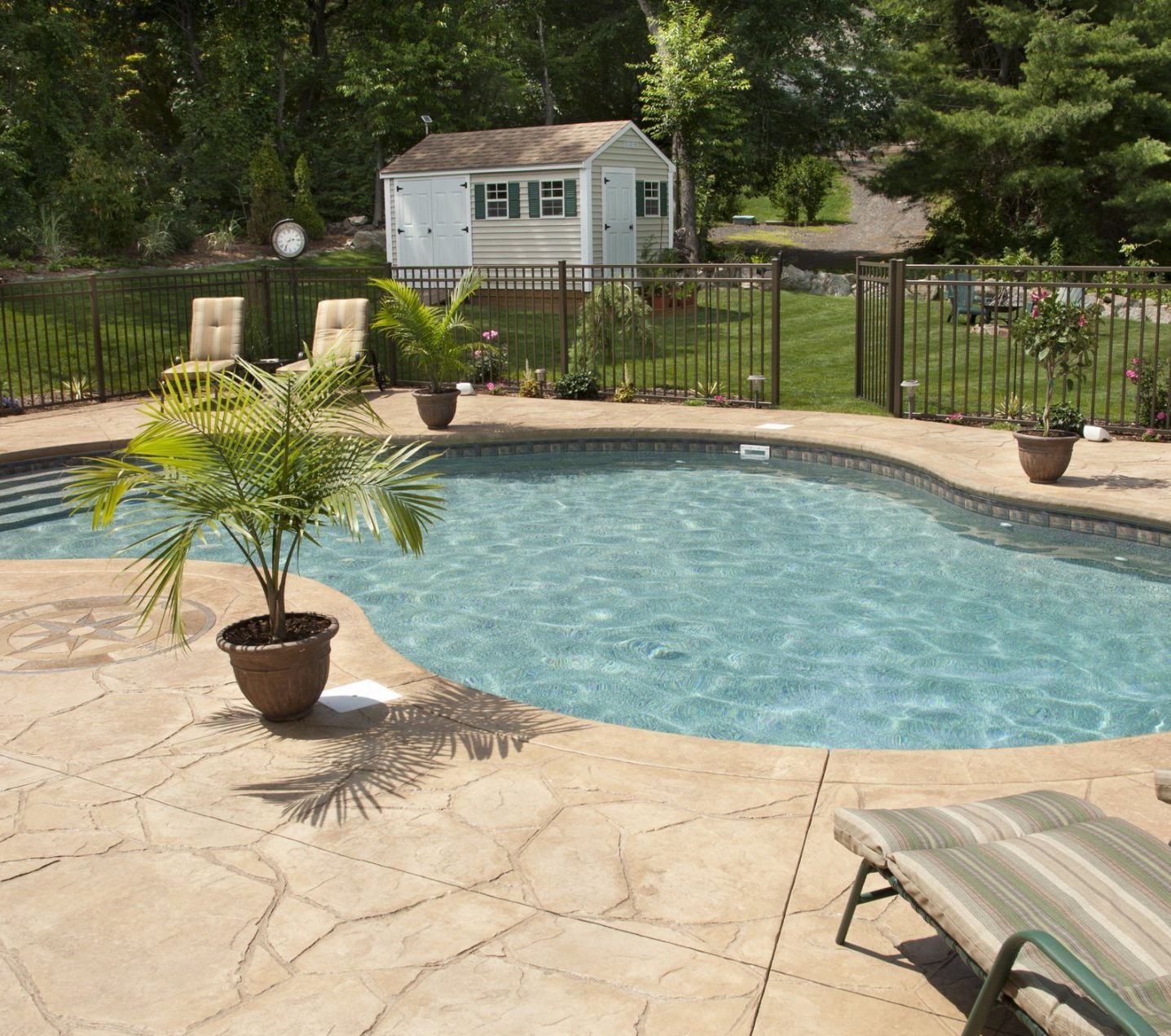 At Peavler Construction, We Always Recommend Installing a Pool Fence That Is Four Feet High.