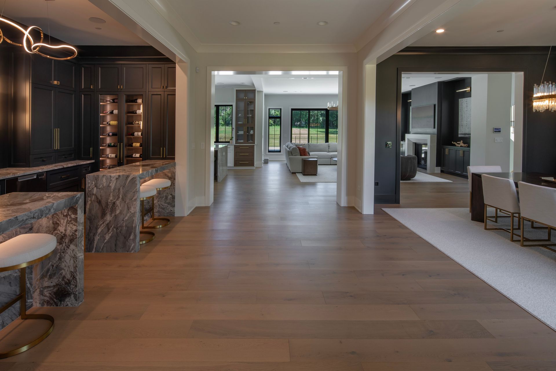 A large house with a kitchen , dining room , and living room.