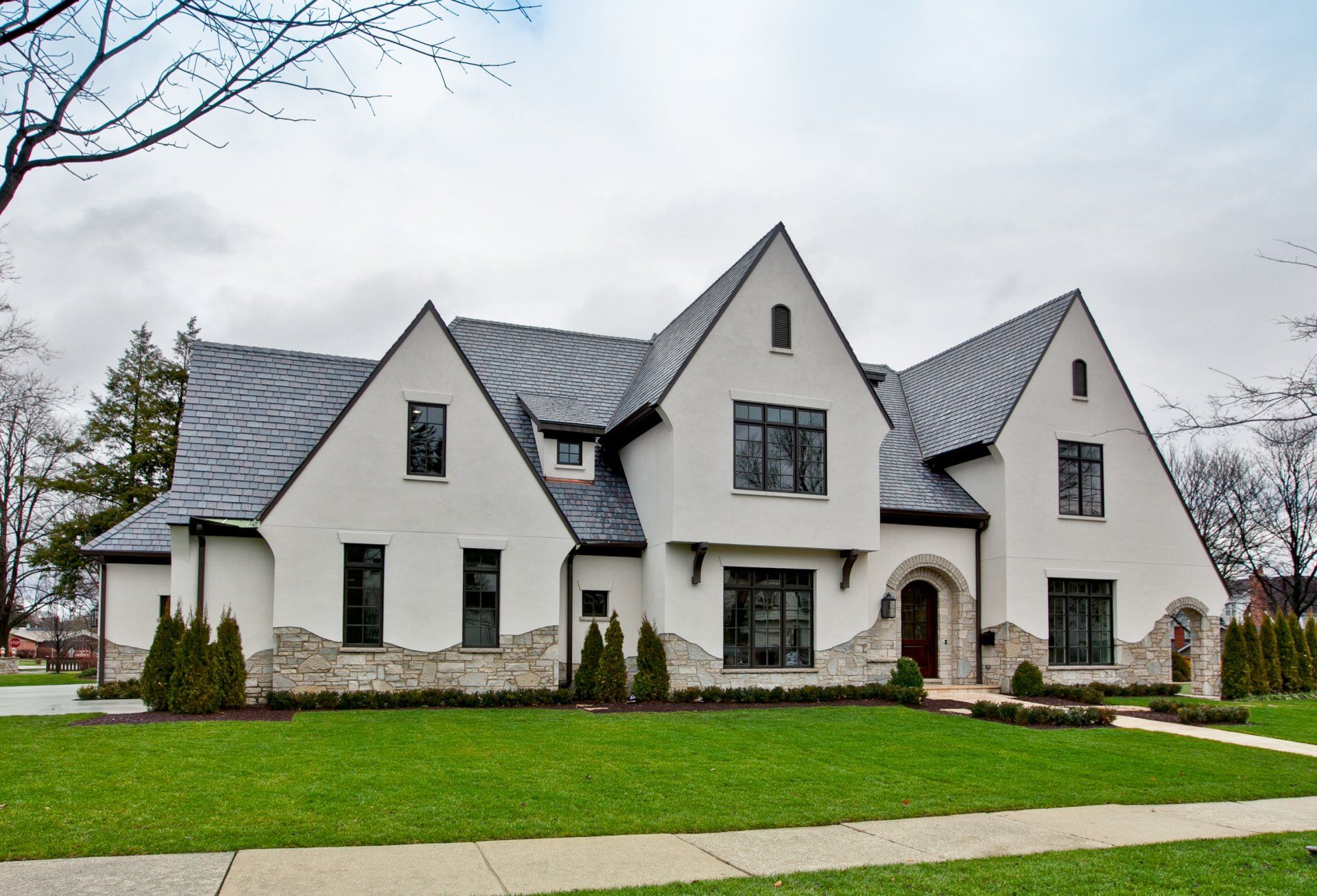 A large white house with a slate roof