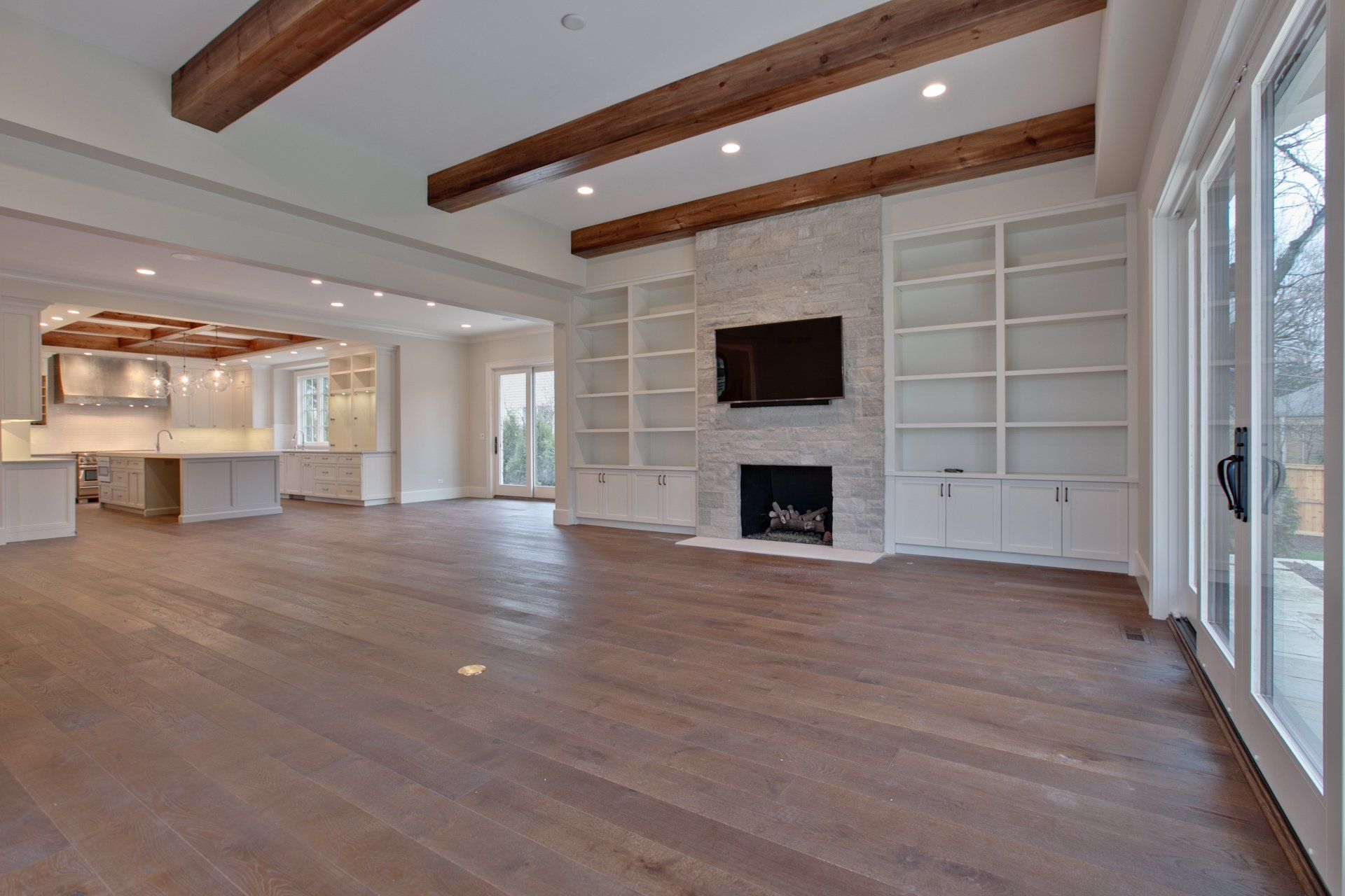 There is a fireplace in the middle of the living room.