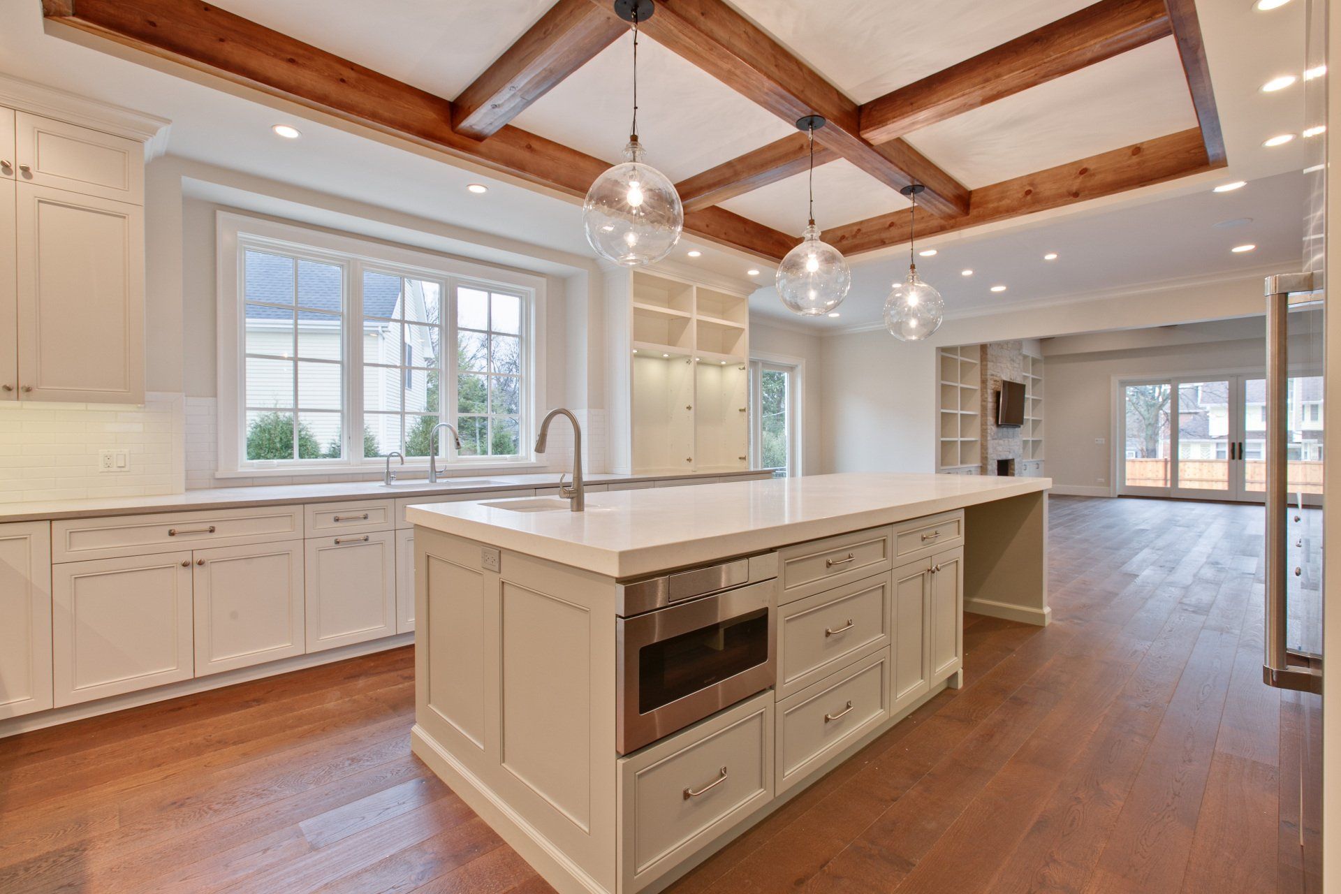 There is a large island in the middle of the kitchen.