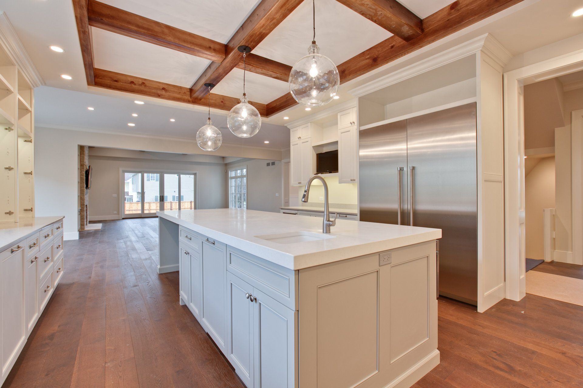 There is a large island in the middle of the kitchen.