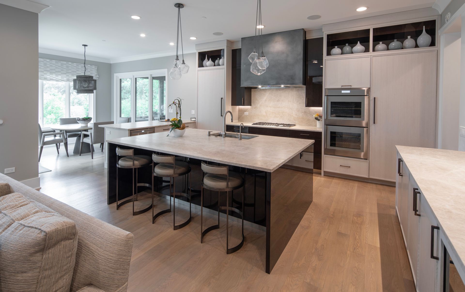 There is a large island in the middle of the kitchen.