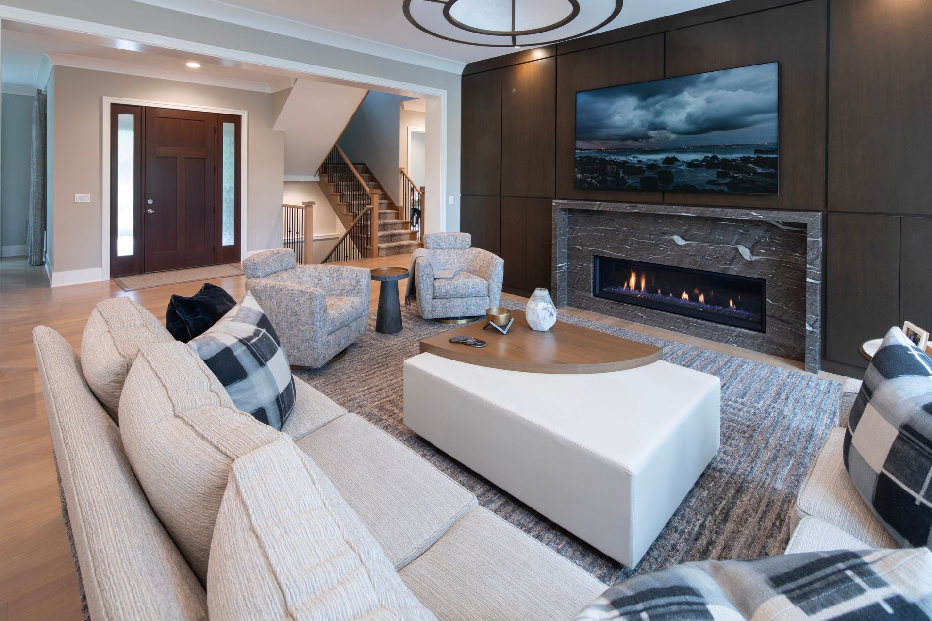 A living room filled with furniture and a fireplace.