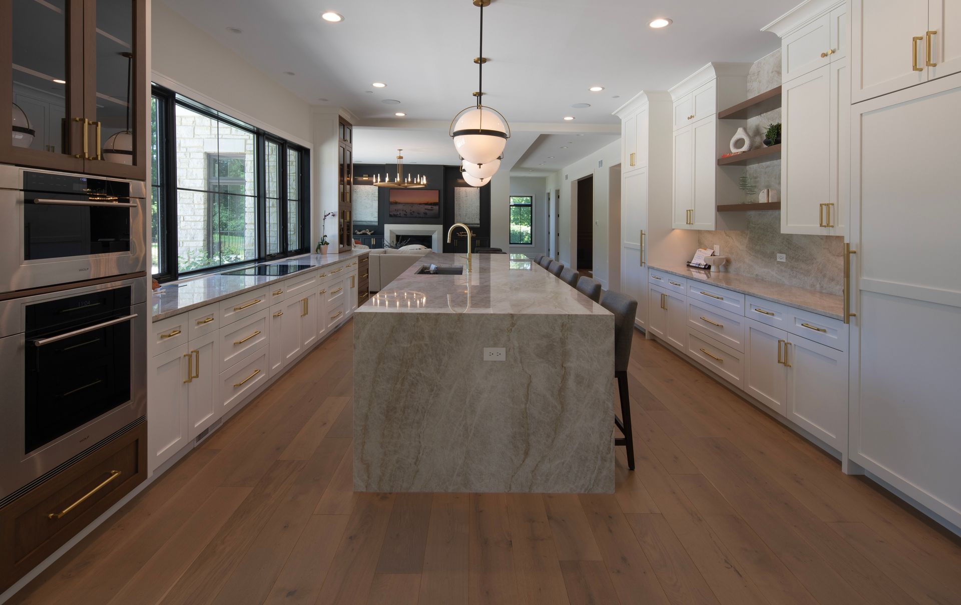 There is a large island in the middle of the kitchen.