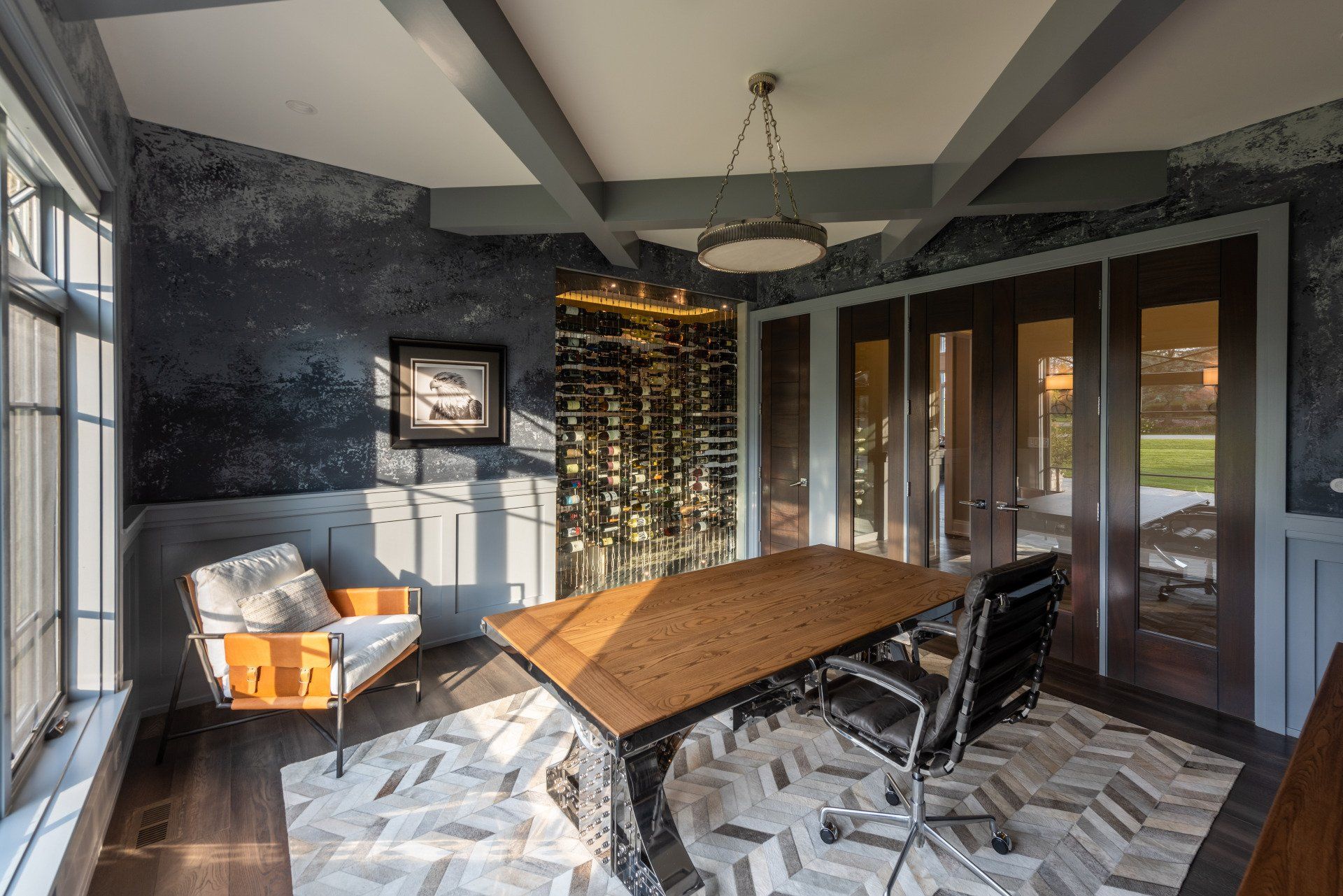 A room with a table and chairs in it