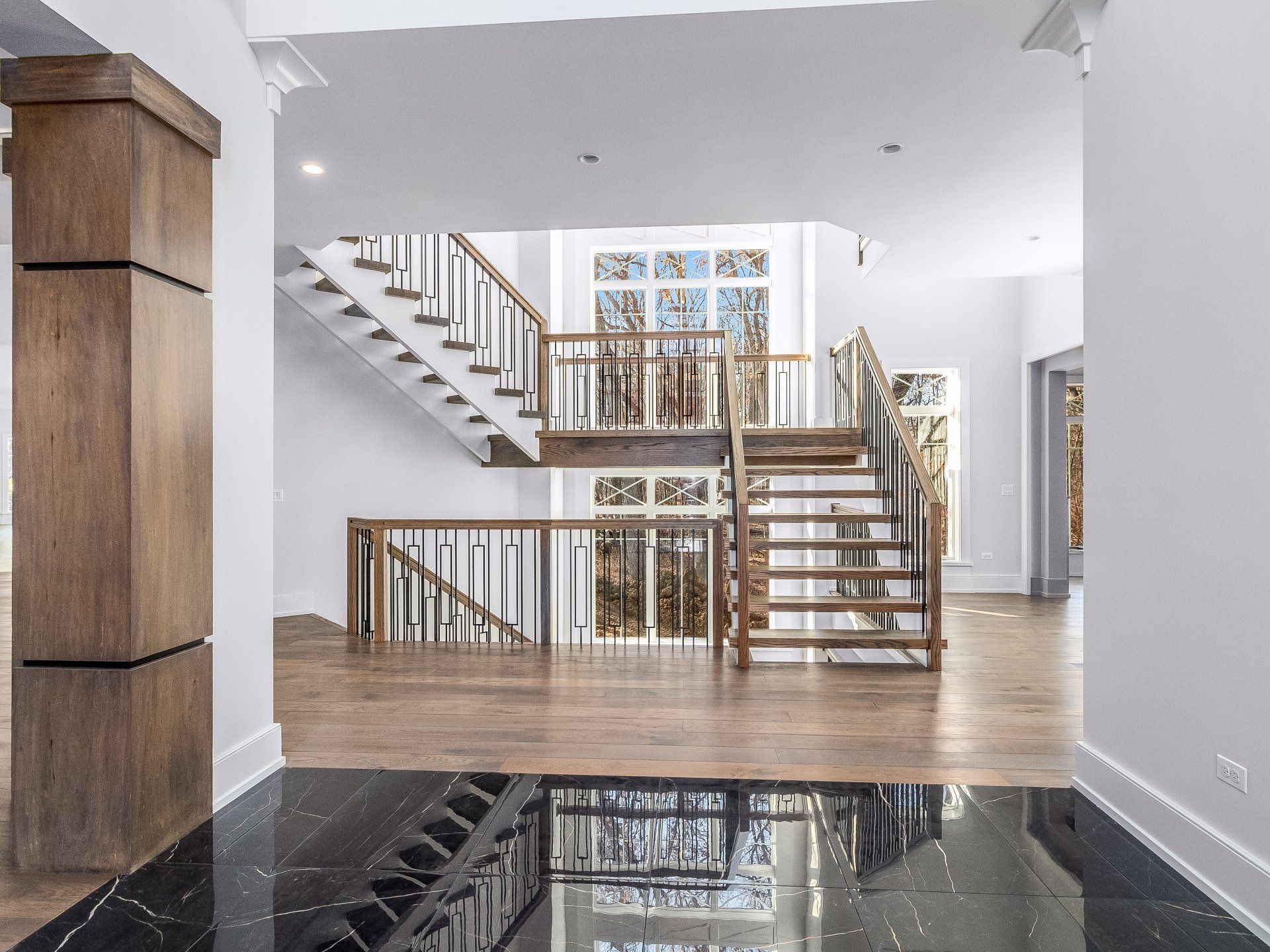 There is a staircase in the middle of the room.