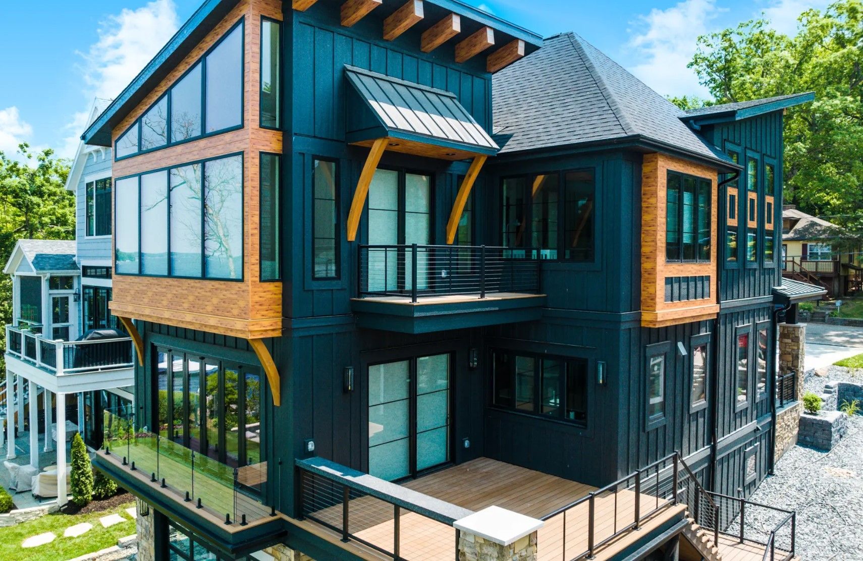 An aerial view of a large house with a lot of windows and balconies.