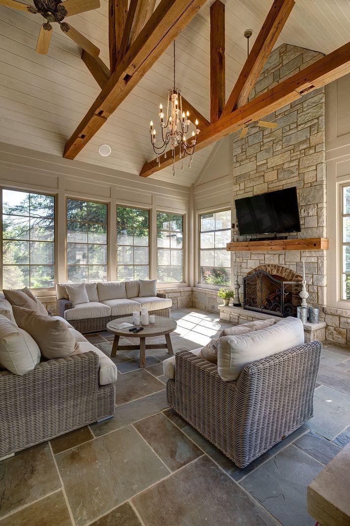 A living room filled with furniture and a fireplace.