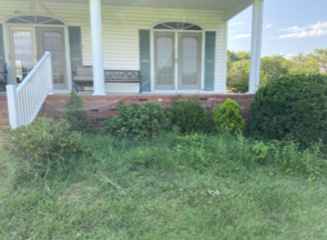 White Colored House | Bolivar, MO | Clay Landscaping, LLC