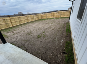 Grassless Field with Fence | Bolivar, MO | Clay Landscaping, LLC