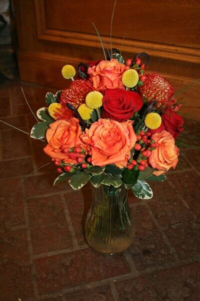Red Orange Flowers arrangement — Special Occasions in Snowmass Village, CO