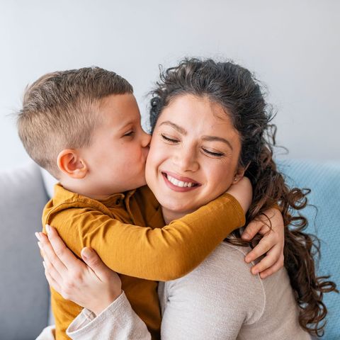 Kid Kissing Mom — Saginaw, MI — Swartz Adoption Agency