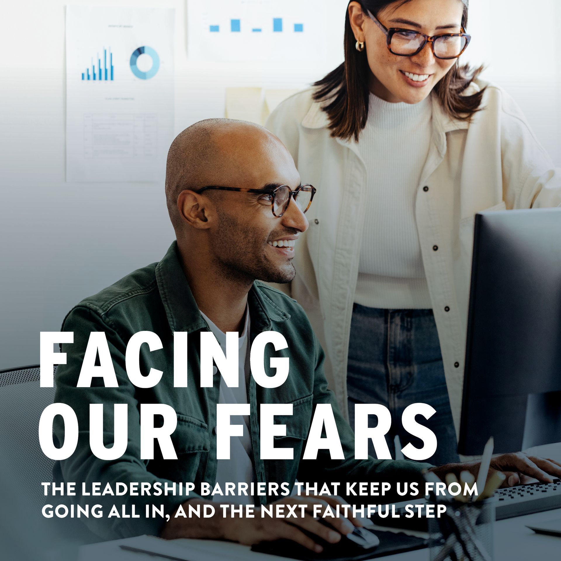 Two people at a computer, smiling, with the words 