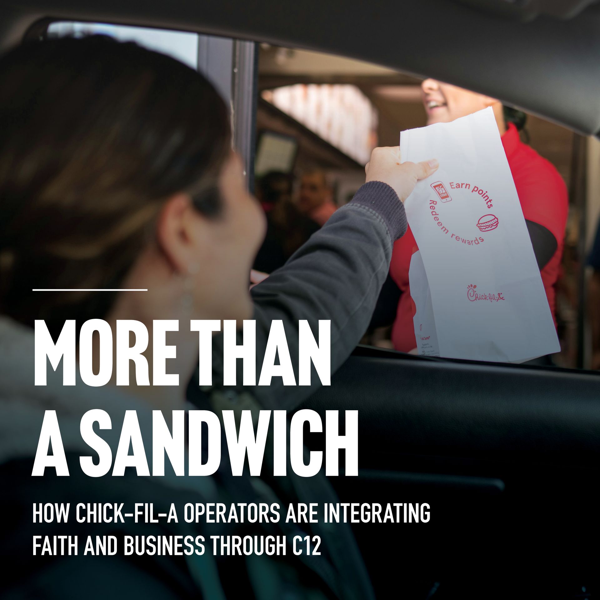 A woman in a car is getting a sandwich from a chick-fil-a worker