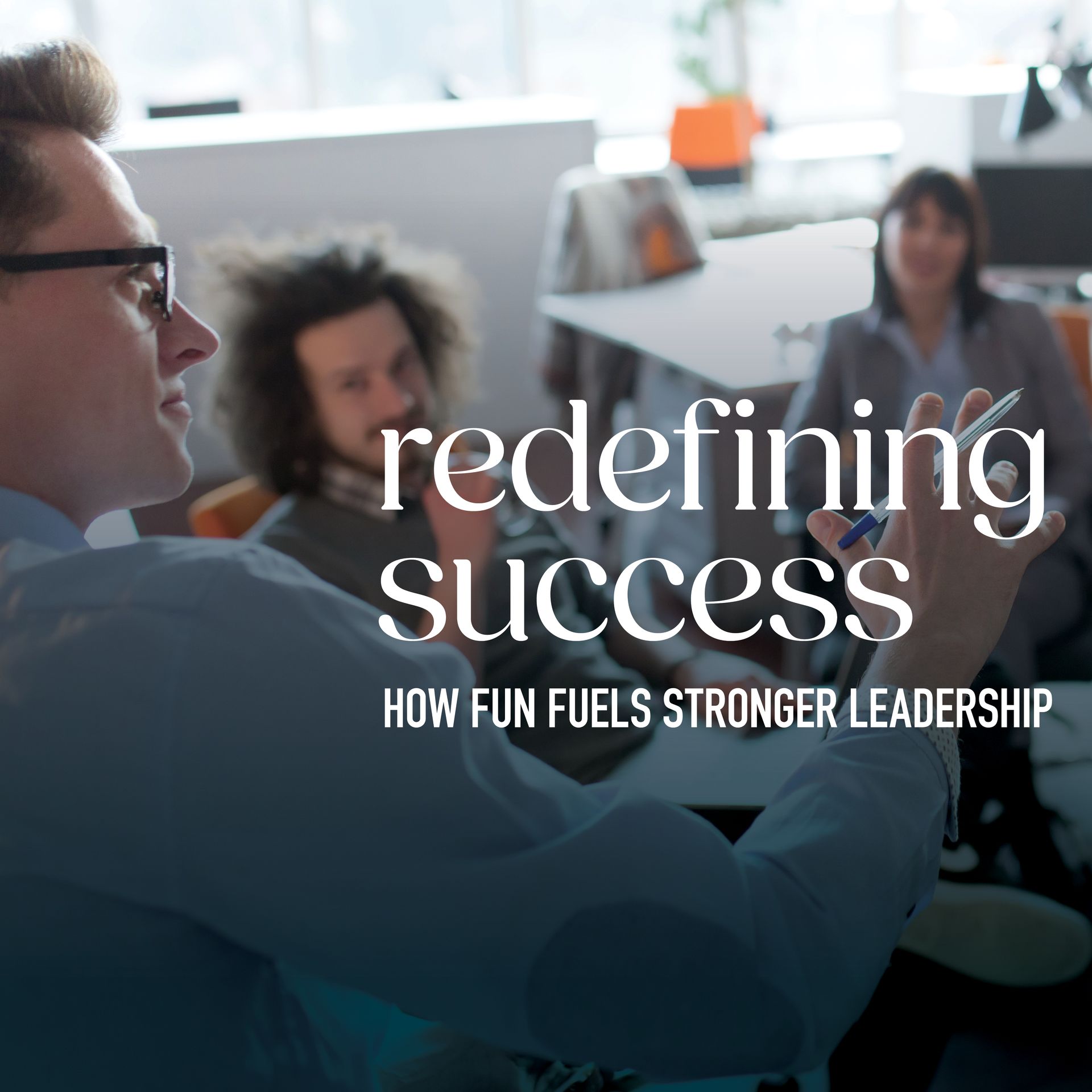 An ad for redefining success shows a man writing on a piece of paper