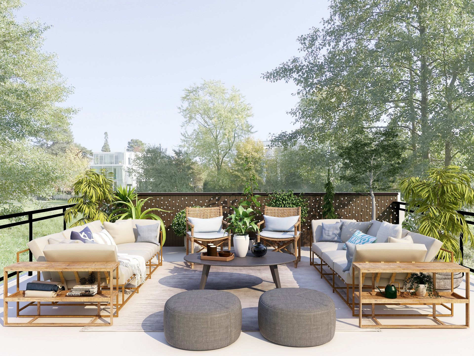 Outdoor patio lounge with beige sofas, gray ottomans, and potted plants overlooking trees and water