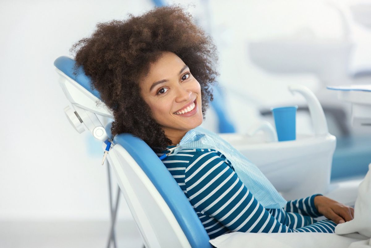 Woman Having Dental Treatment — Perry County, MS — New Augusta Dental Clinic