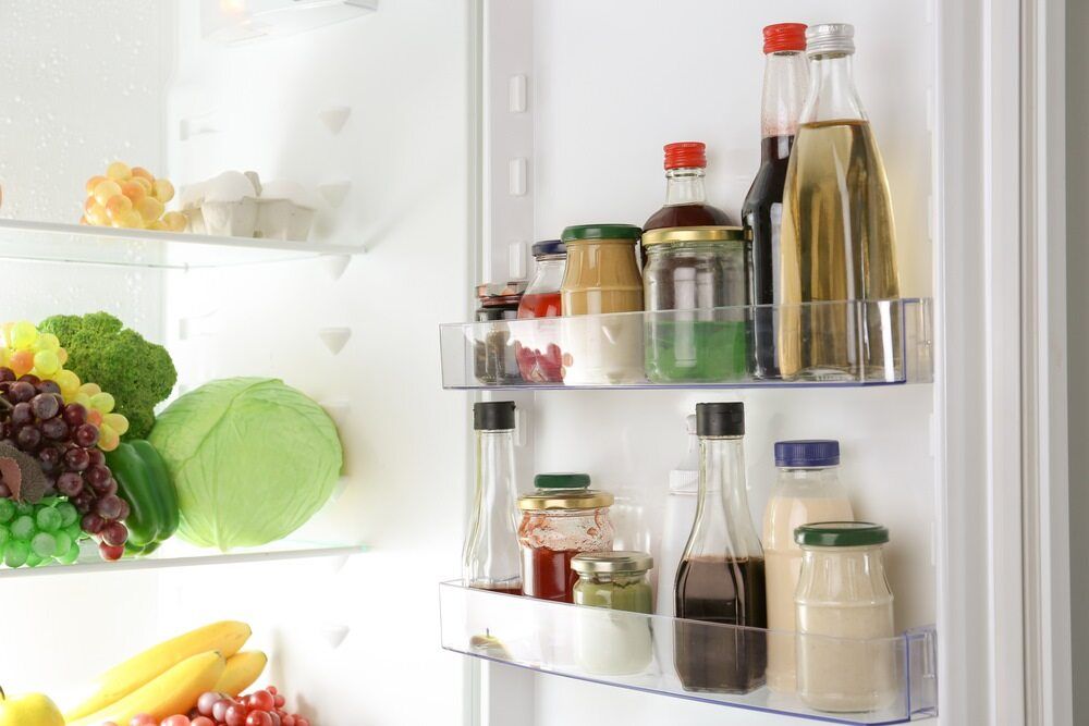 A Refrigerator Filled With Bottles , Jars , Fruits And Vegetables — Ace Fridge Door Seals In Cairns, QLD