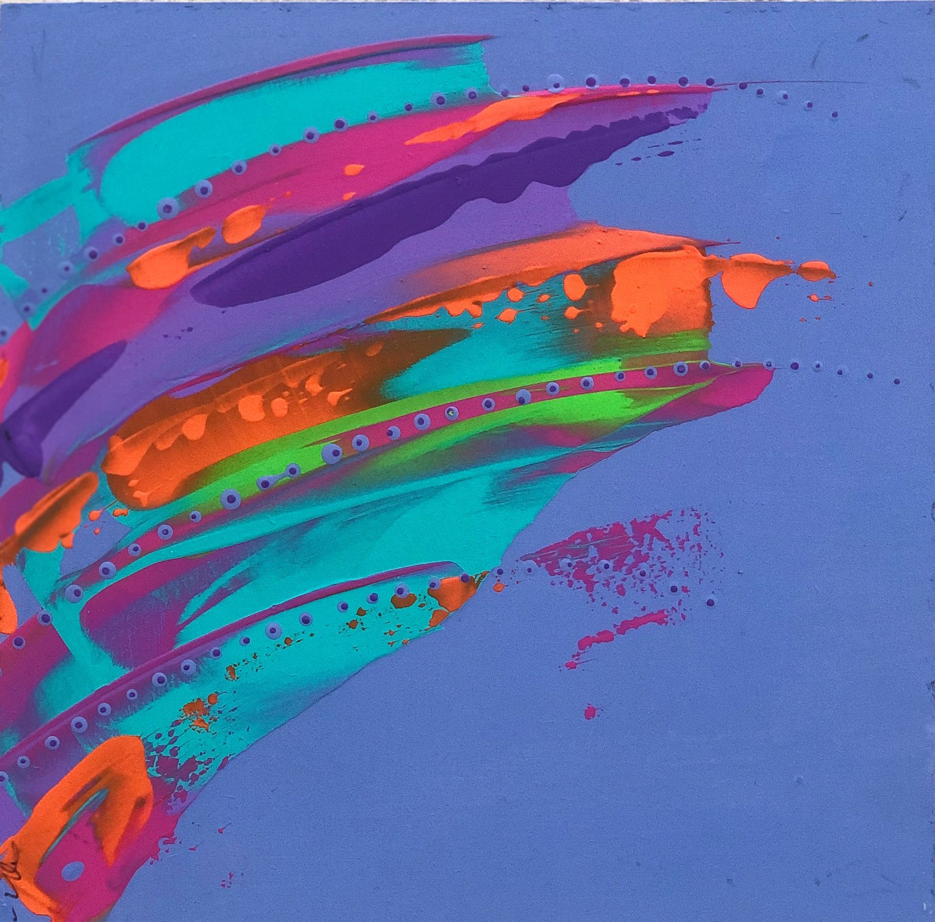 Blue scarf with abstract design of red, turquoise, and purple brushstrokes draped over a black mannequin.