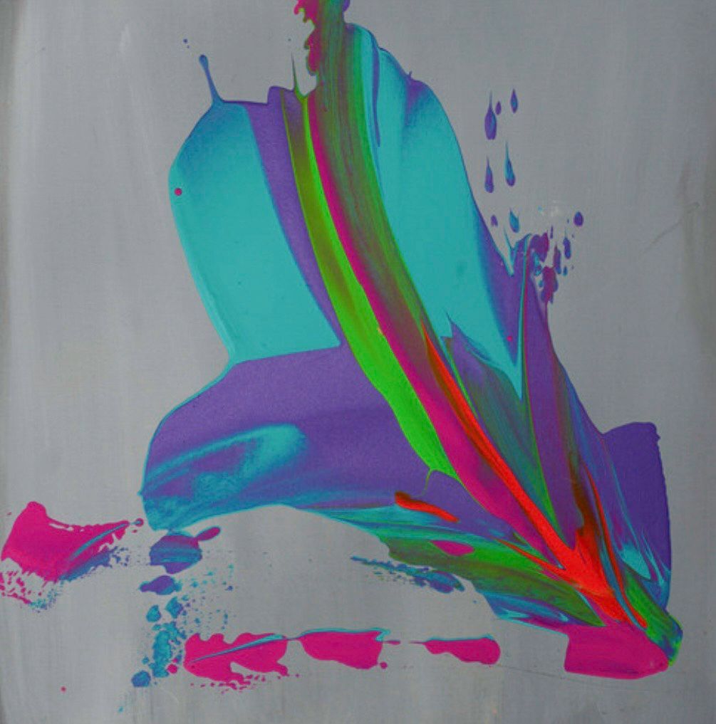 Scarf draped over a black mannequin; light blue background with abstract blue and pink paint strokes.
