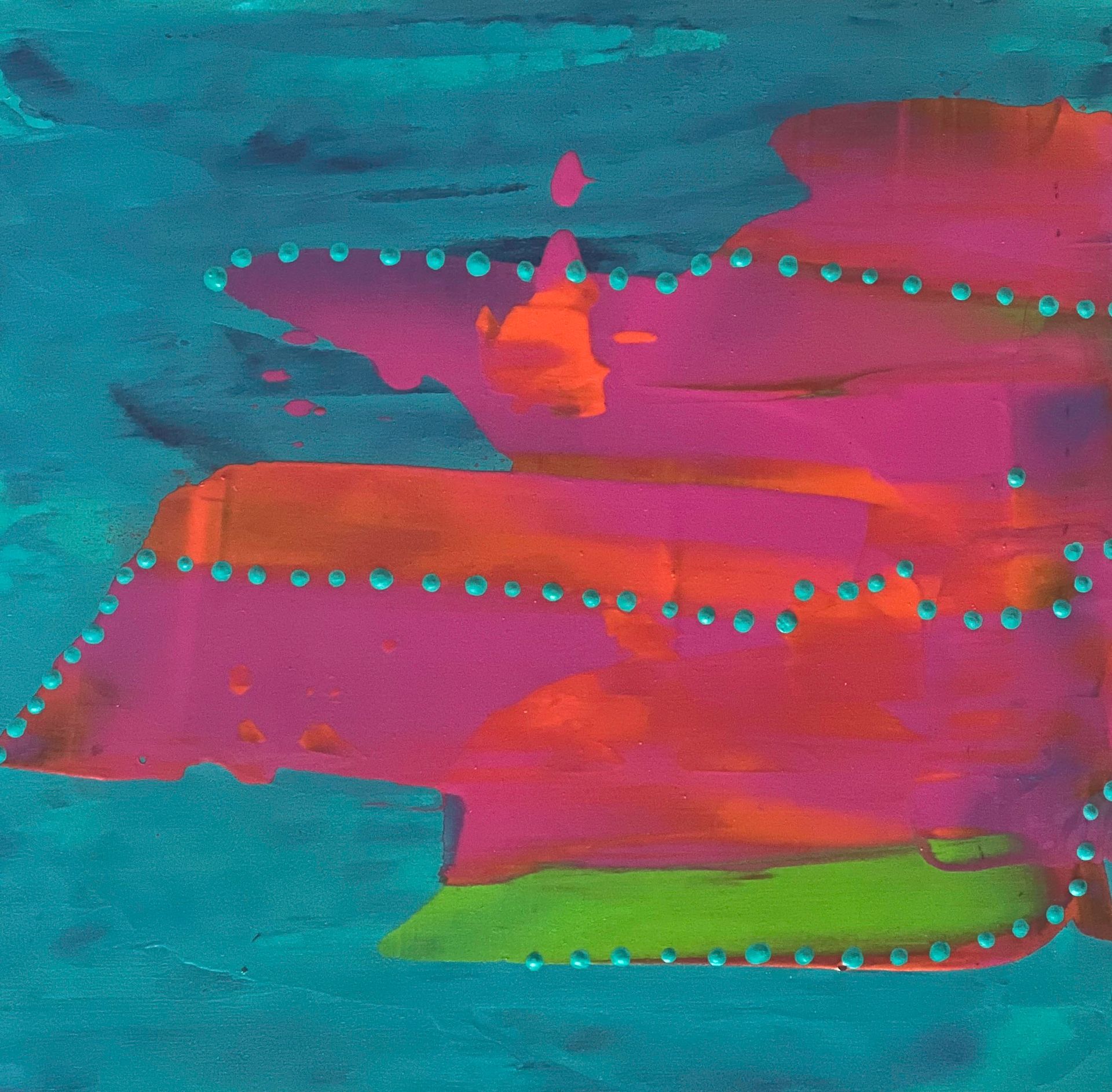 Colorful silk scarf draped on a black mannequin, with abstract brushstroke design in blues, pinks, and reds.