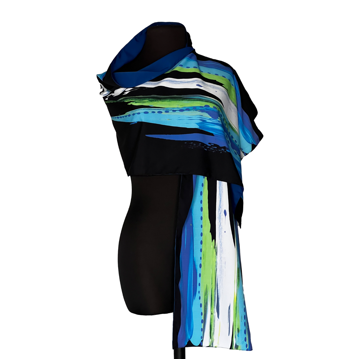 A colorful, abstract scarf draped on a black mannequin; blues, greens, and white paint-like strokes.