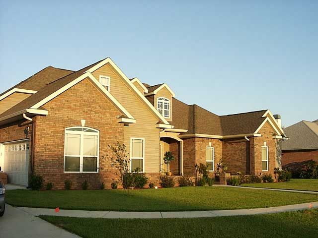 Cream Colored Downspouts — Pensacola, FL — Metal Masters of Pensacola, Inc