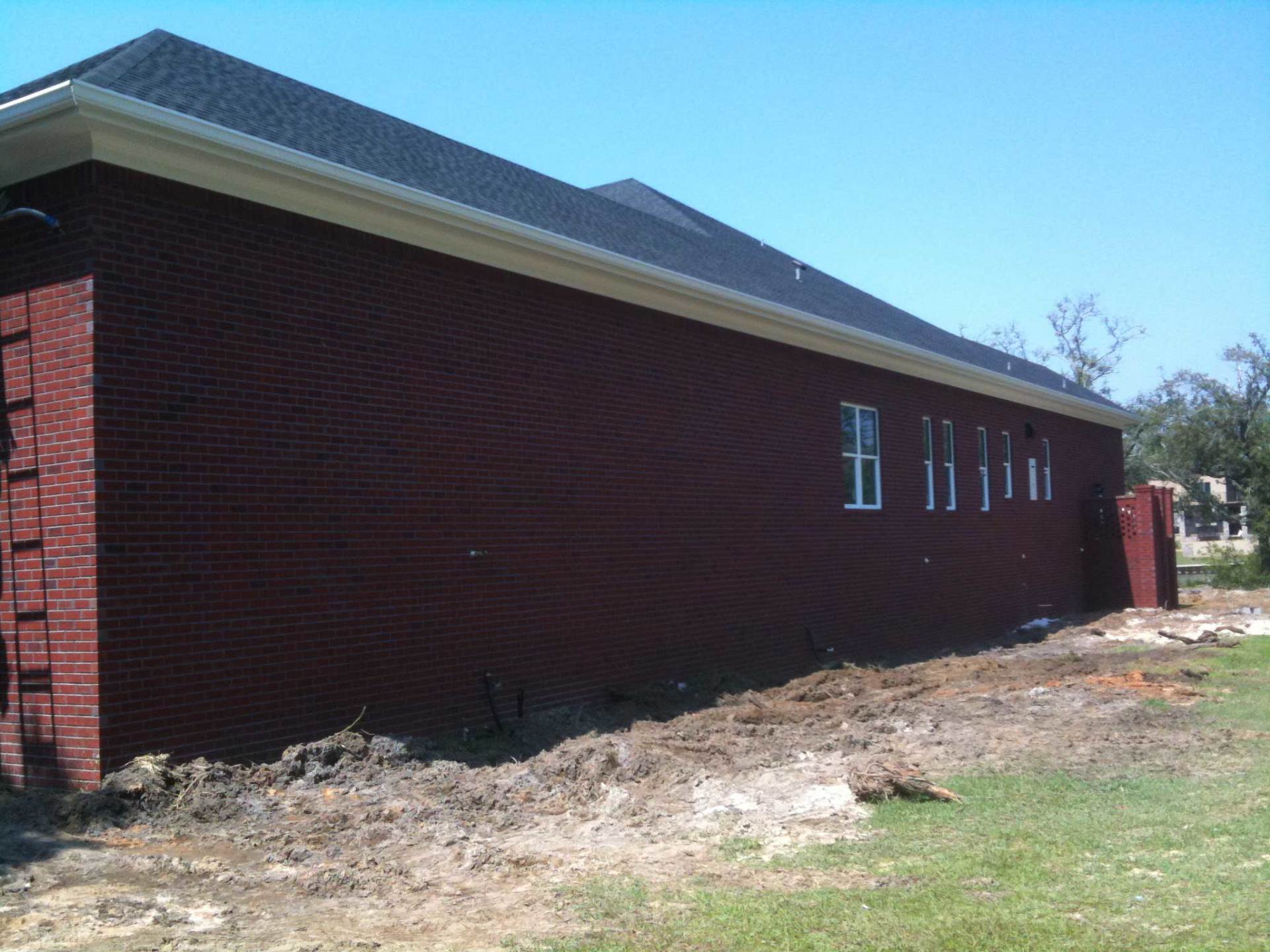 Seamless Gutter On Two Story High House — Pensacola, FL — Metal Masters of Pensacola, Inc