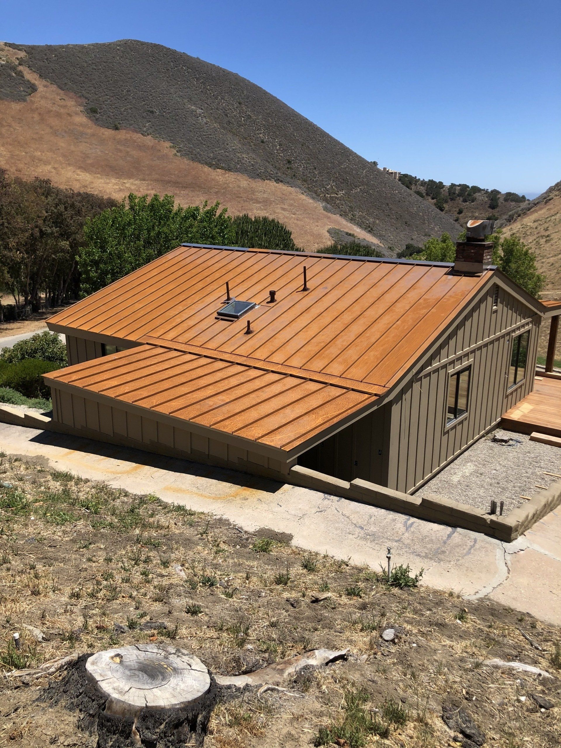 Top View Shot Of A House With Orange Metal Roof — Santa Barbara, CA — All About Metal Inc.