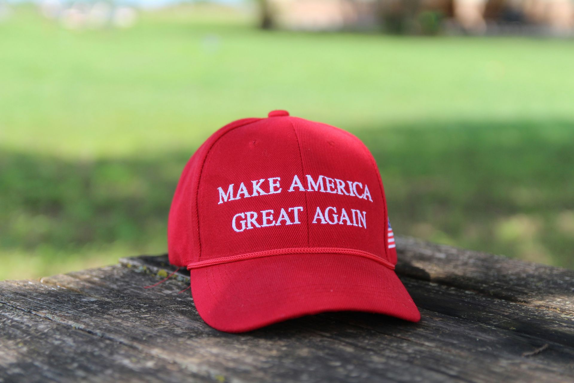 Picture of red baseball cap that says Make America Great Again