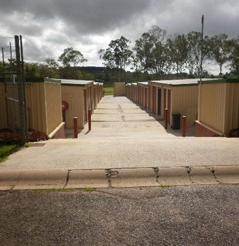 A Row of Storage Units on a Cloudy Day — Tableland Self Storage In Atherton, QLD