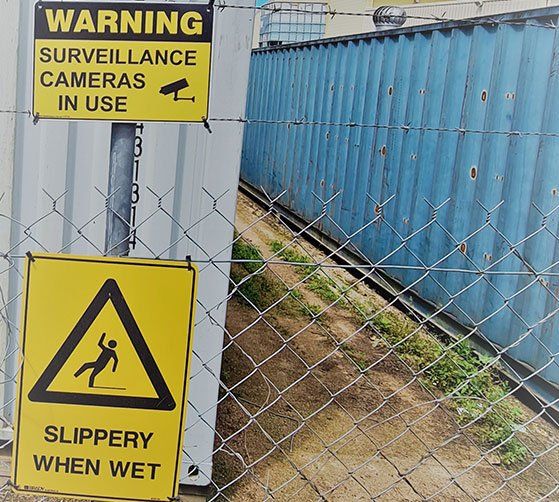 A Warning Sign That Says Surveillance Cameras in Use — Tableland Self Storage In Atherton, QLD