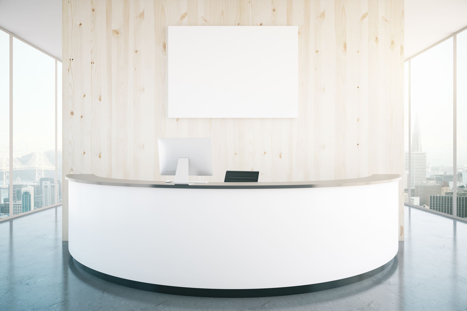 a white reception desk with a computer on it in a room with a wooden wall .