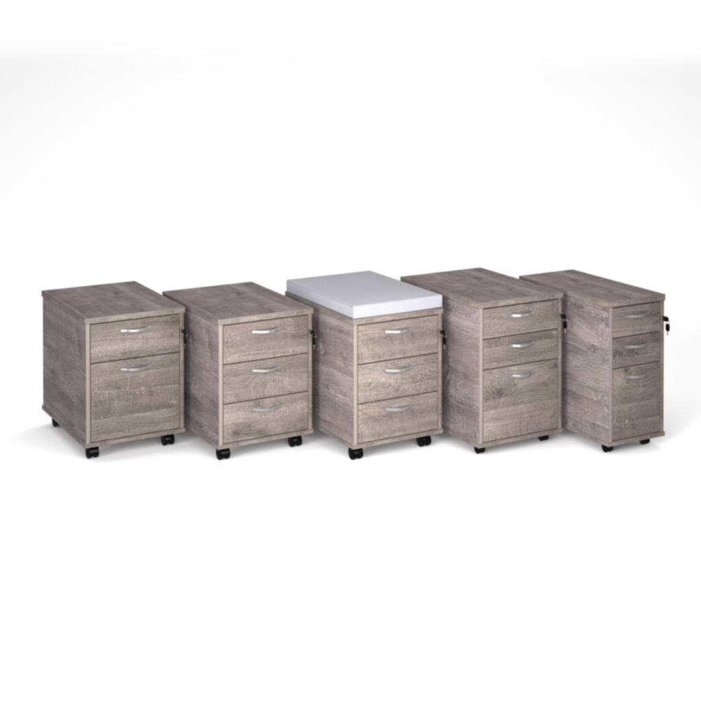 a row of wooden filing cabinets are lined up in a row on a white background .