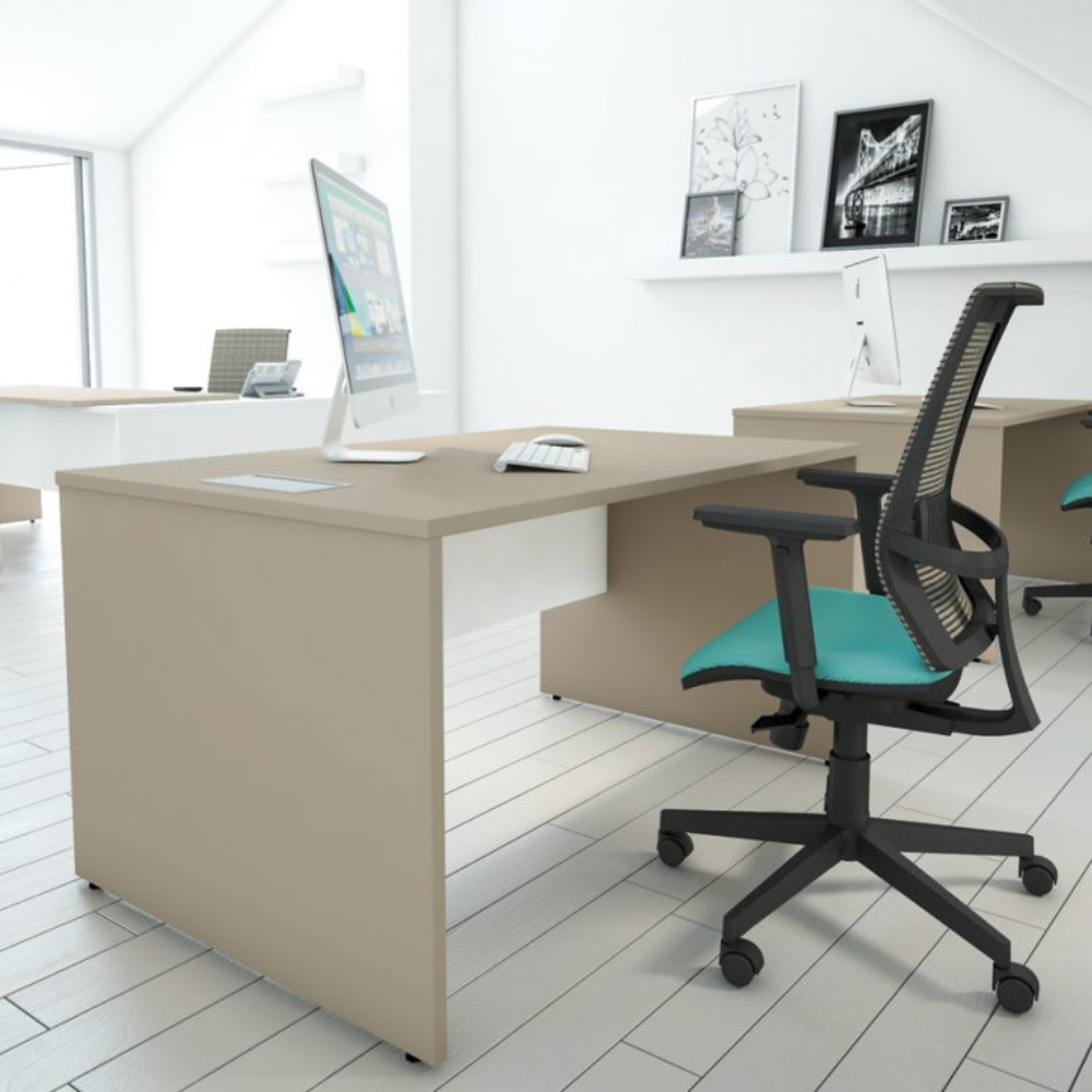 a desk with a computer on it and a chair