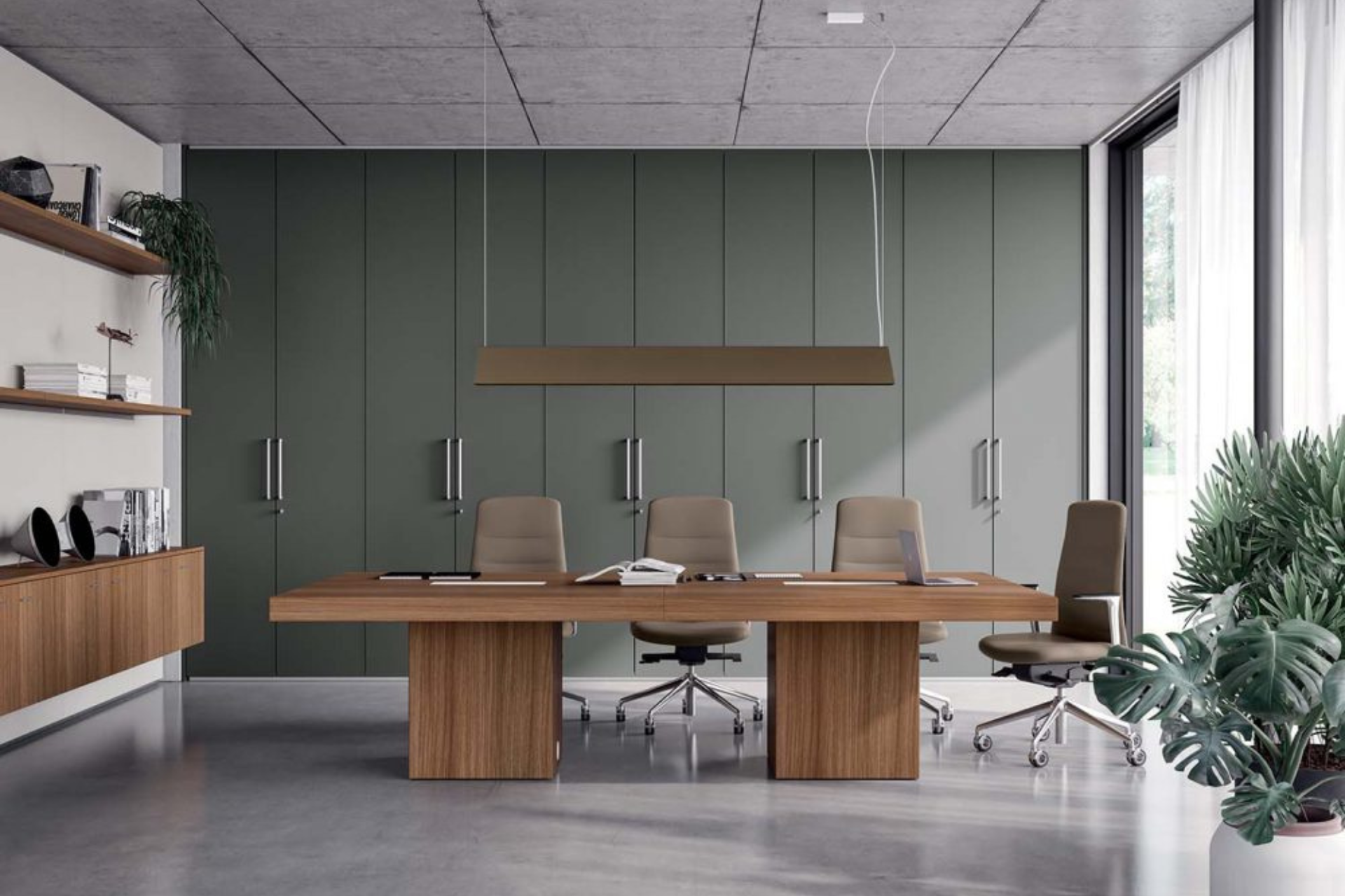 a conference room with a long wooden table and chairs .