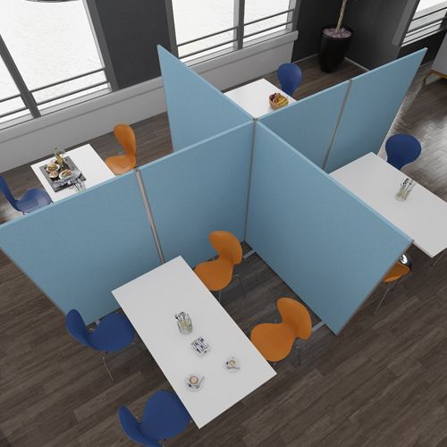 an aerial view of a room with tables and chairs