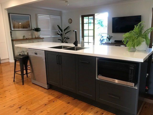 Modern Kitchen Interior with a Dining Zone, Modern White Interior | Castle Hill, Nsw | Galaxy Kitchens & Bathrooms