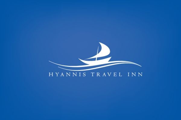 A logo for hyannis travel inn with a sailboat on a blue background