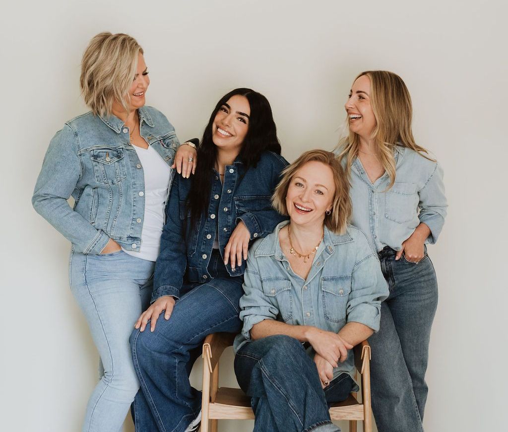 smiling middle aged blonde woman looking at camera