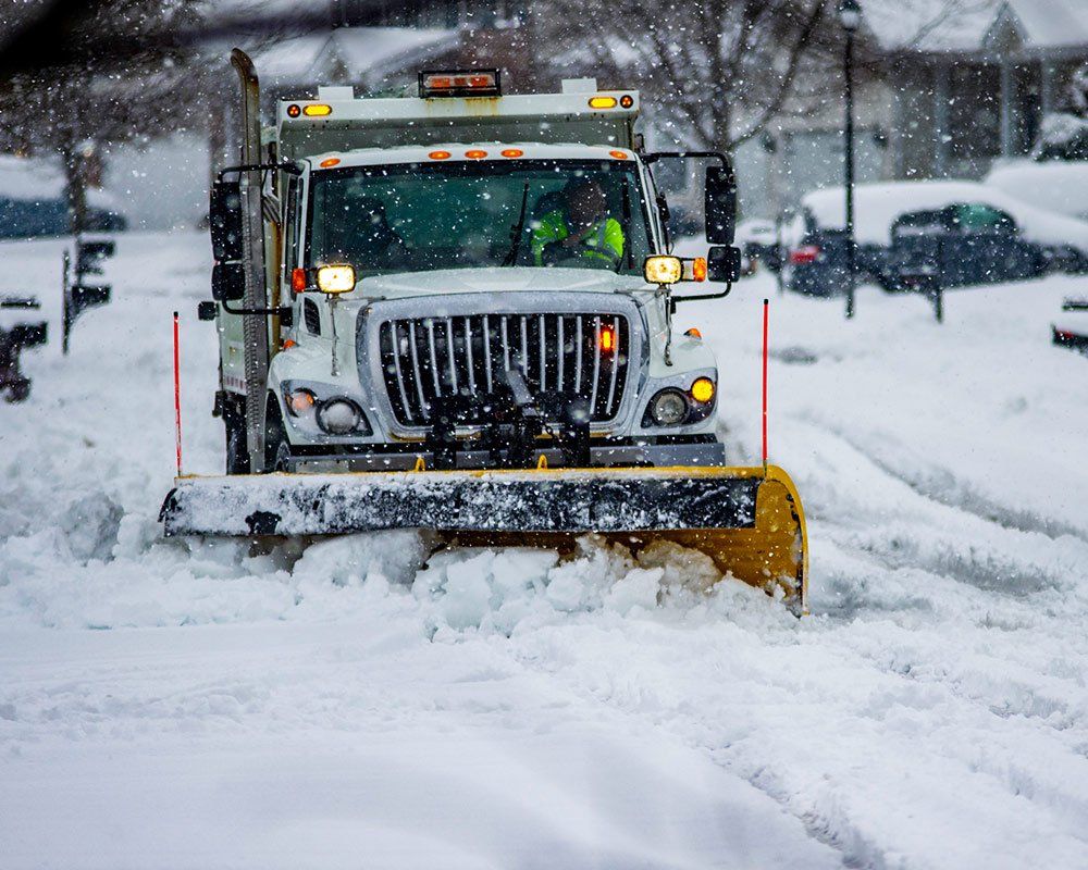 Heavy Equipment Driver Working to Push Snow — Sparta, WI — Wayne Bohl Trucking LLC
