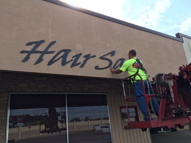 Hair Salon Sign Installation — Sign Dealers in Rochester, MN