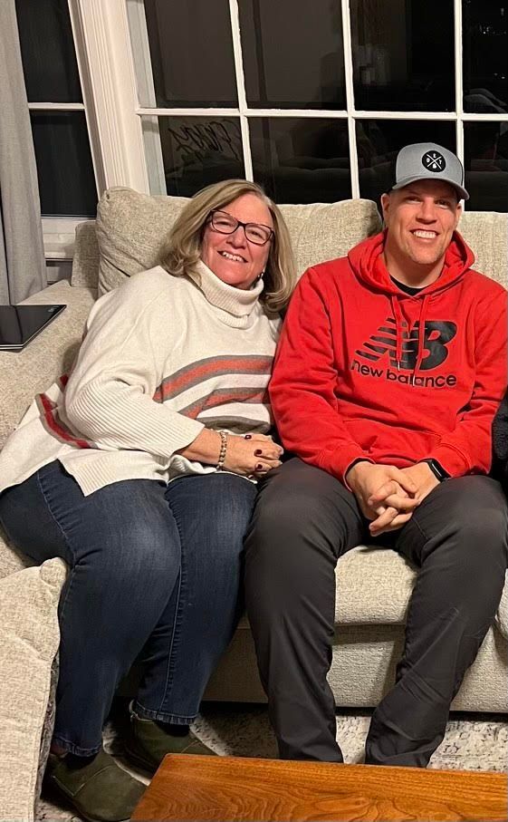Image of RETEX's Mark Erickson siting next to his mom. 