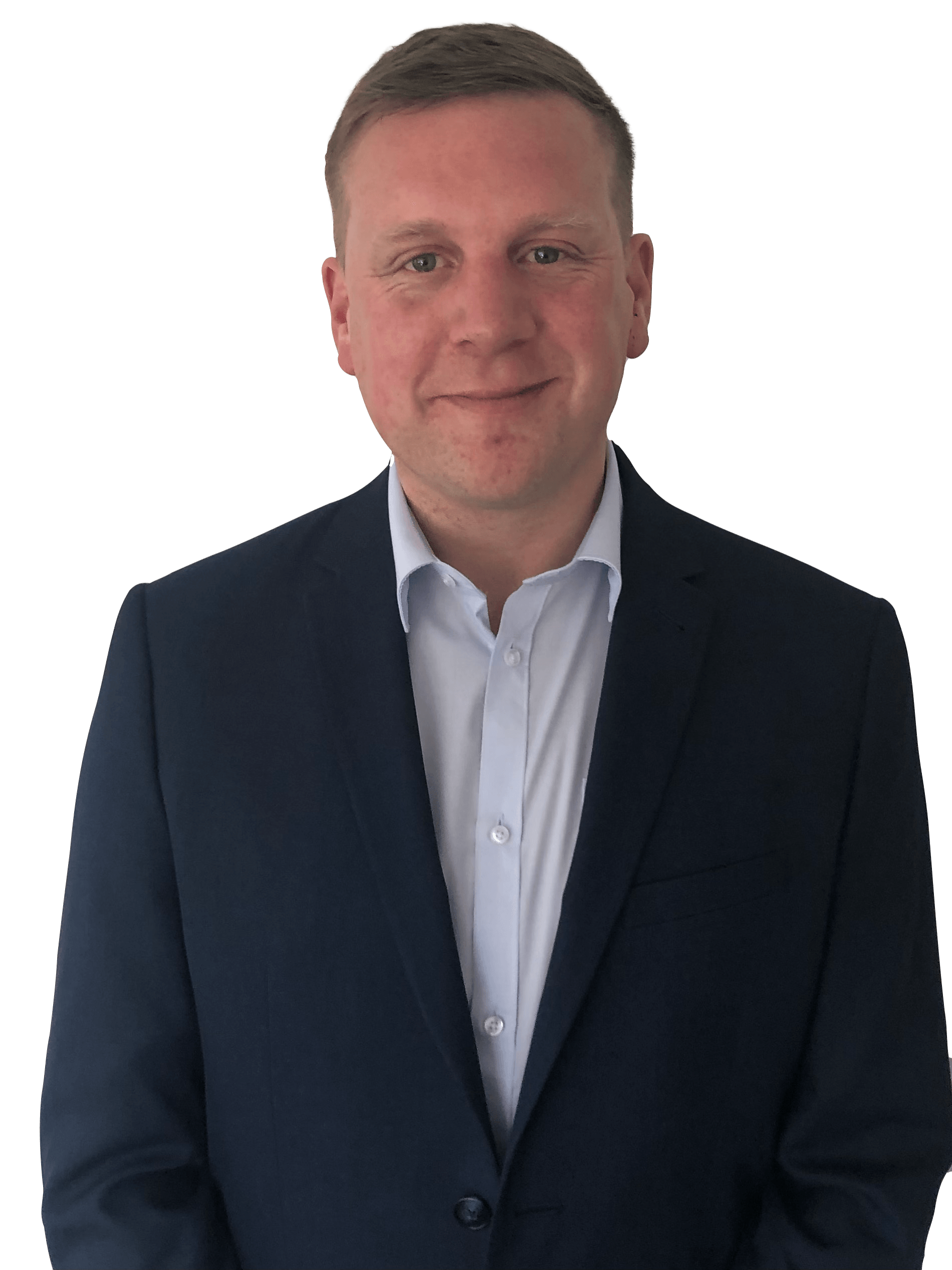 A man in a suit and white shirt is standing in front of a white background.