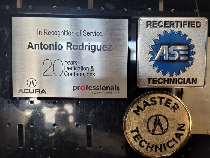 A plaque that says antonio rodriguez on it