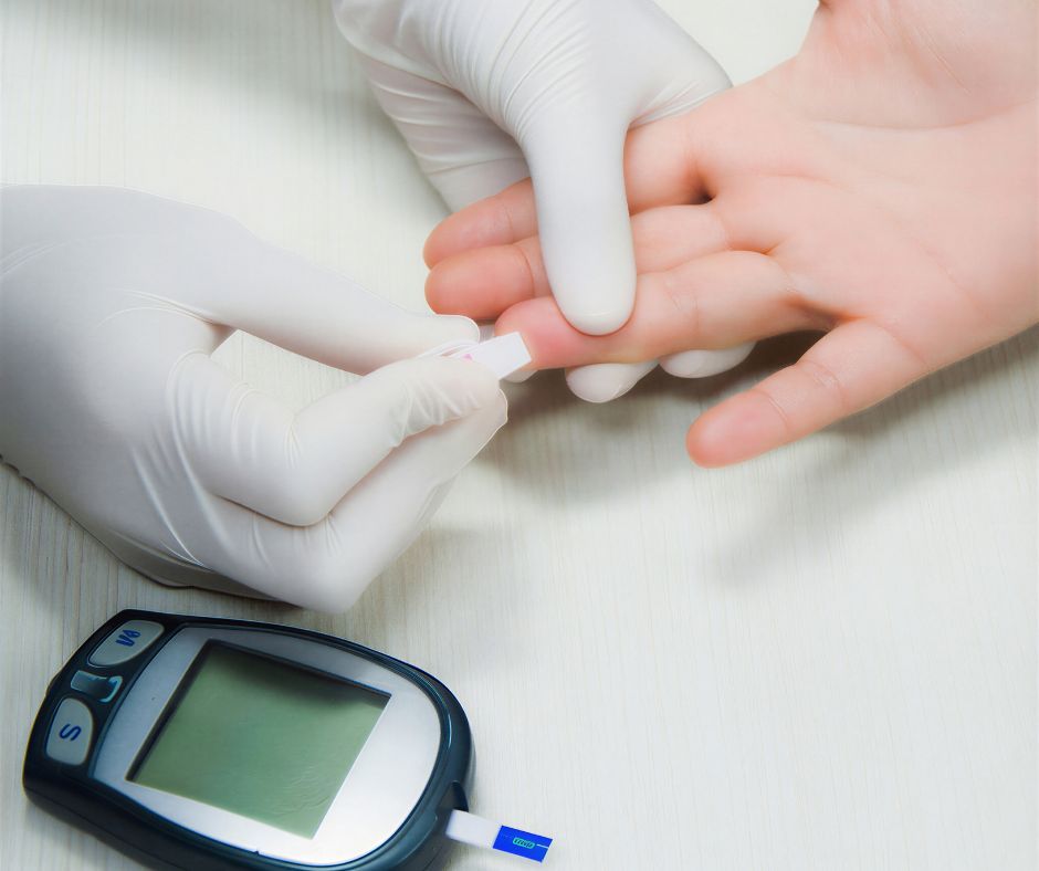 Blood sugar monitoring using a glucometer with finger-prick test.