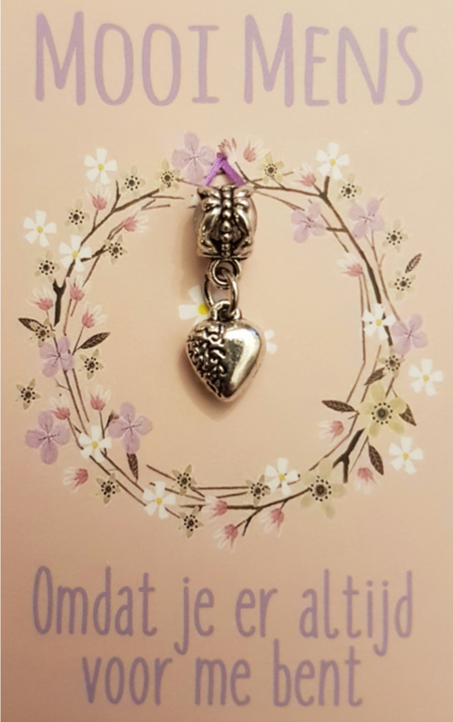 Card with a heart charm. Text says 
