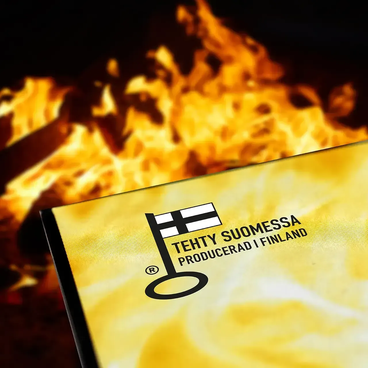 A yellow sign that says Tehty Suomessa producerad i finland